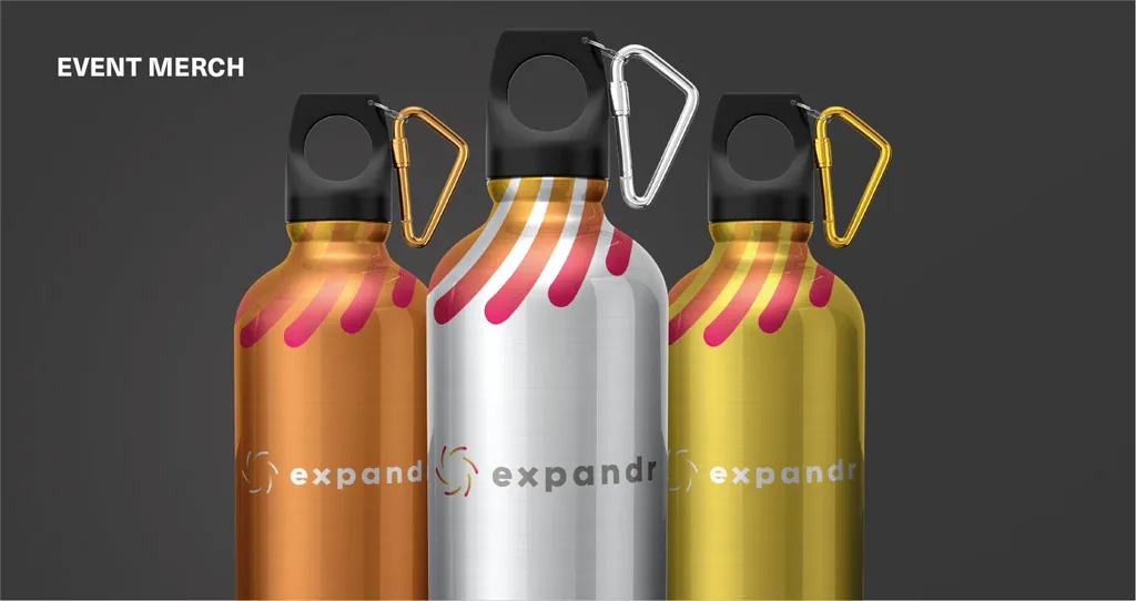 Event merch: three Expandr water bottles in copper, silver and gold