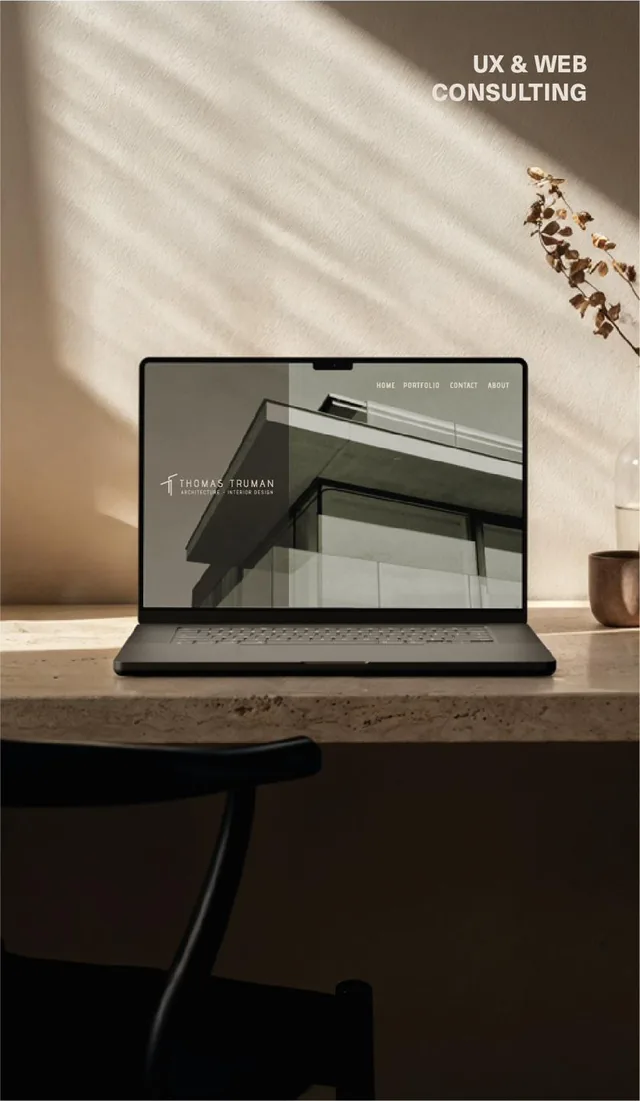 UX and web: Thomas Truman website on a laptop on a stone desk