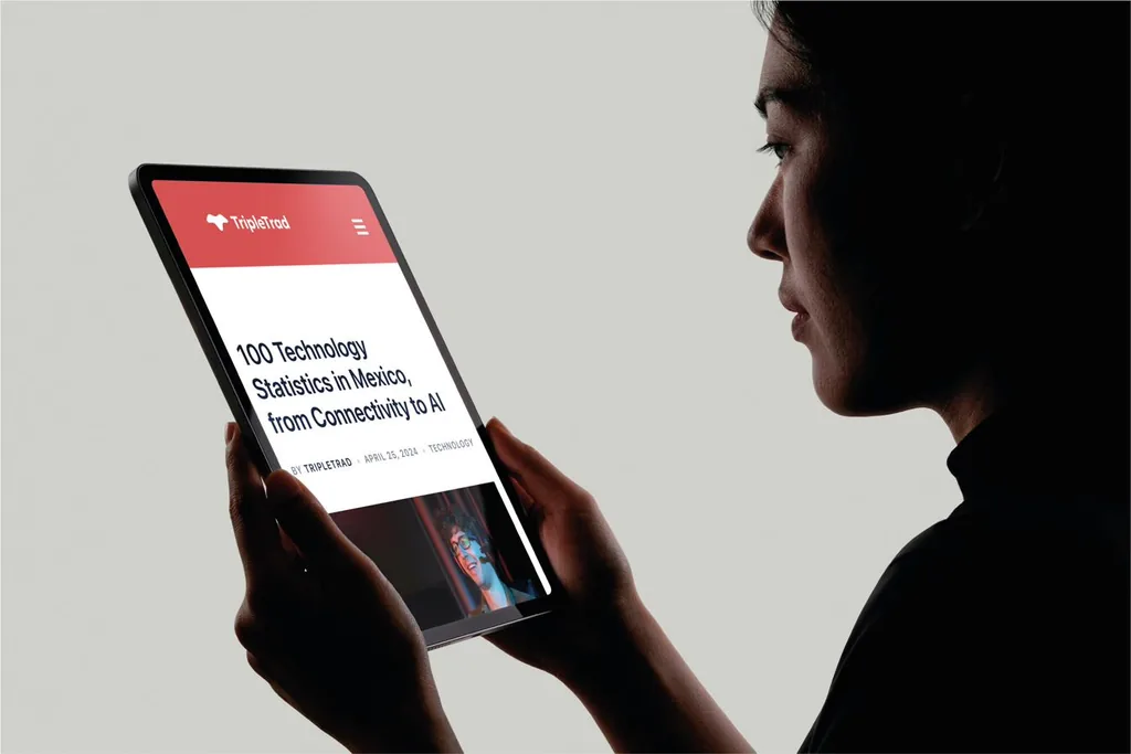 Woman reading a TripleTrad blog article on a tablet