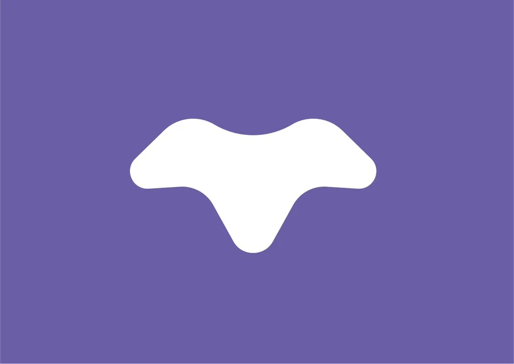 TripleTrad wing-shaped T symbol in white on purple
